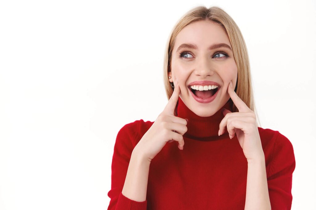 a woman in a red sweater